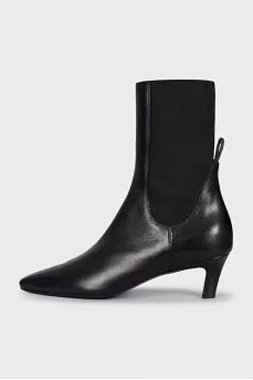 Black leather ankle boots with a square toe