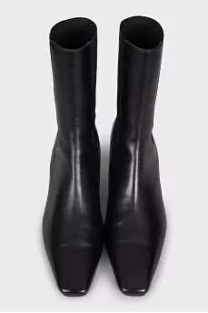 Black leather ankle boots with a square toe
