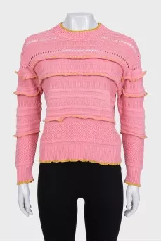 Pink jumper with perforations and accent seam