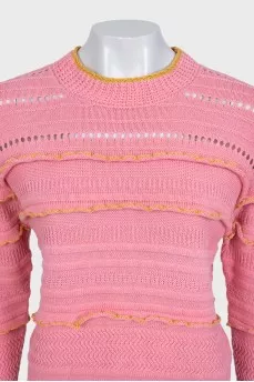 Pink jumper with perforations and accent seam