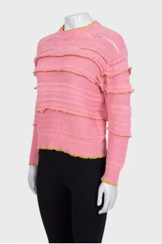 Pink jumper with perforations and accent seam