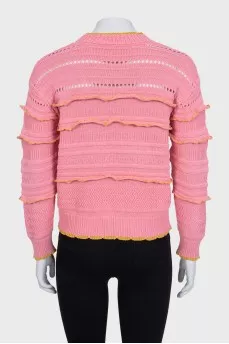 Pink jumper with perforations and accent seam