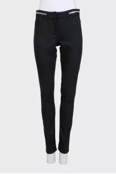 Black jeans with silver trim on the waistband