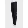 Black jeans with silver trim on the waistband