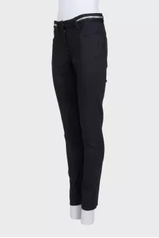 Black jeans with silver trim on the waistband