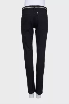 Black jeans with silver trim on the waistband