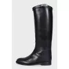 Black leather boots with signature buckle