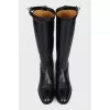 Black leather boots with signature buckle