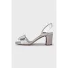 Silver leather sandals with a bow