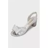 Silver leather sandals with a bow