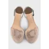 Silver leather sandals with a bow