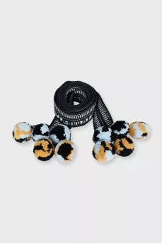 Blue textile belt with pom-poms