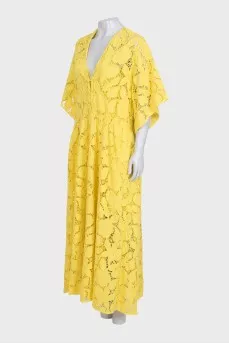 A loose-fitting lace dress with buttons