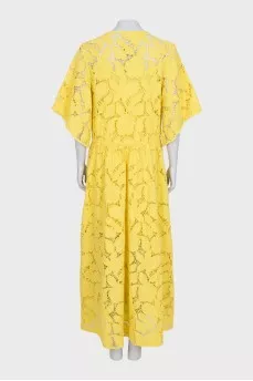 A loose-fitting lace dress with buttons