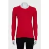 Red jumper with patches on the sleeves