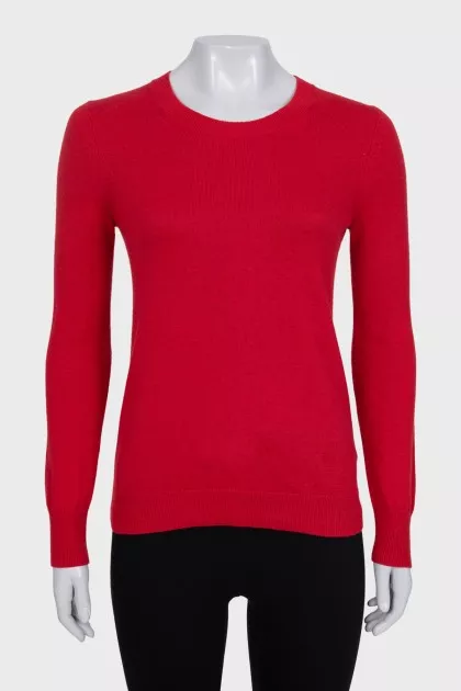 Red jumper with patches on the sleeves