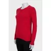 Red jumper with patches on the sleeves
