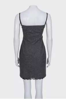 Fitted dress with lace trim at the bottom
