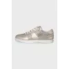 Leather sneakers with embossed logo