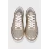 Leather sneakers with embossed logo