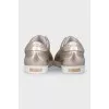 Leather sneakers with embossed logo