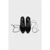 Leather and textile mules with laces