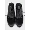 Leather and textile mules with laces