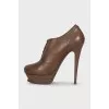 Brown leather ankle boots with heels