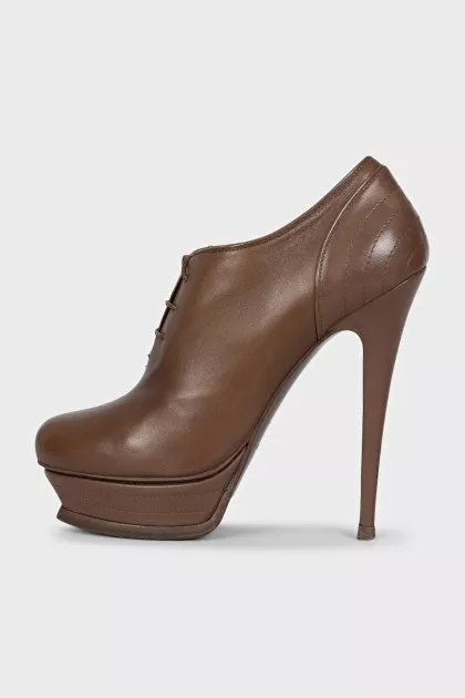 Brown leather ankle boots with heels
