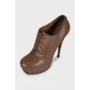 Brown leather ankle boots with heels