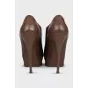 Brown leather ankle boots with heels