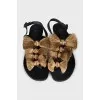 Sandals decorated with voluminous bows
