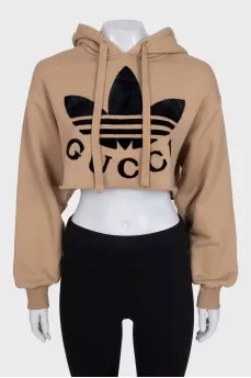 Brown hoodie by Gucci x Adidas with tag