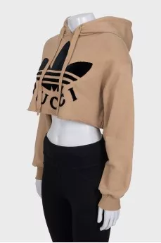 Brown hoodie by Gucci x Adidas with tag