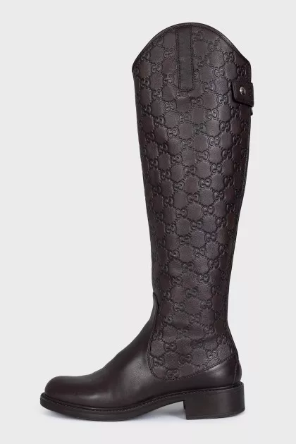 Brown boots with branded embossing