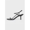 Black leather heeled sandals