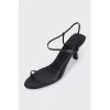 Black leather heeled sandals