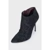 Black suede ankle boots with heels