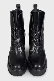Black leather ankle boots with brand logo