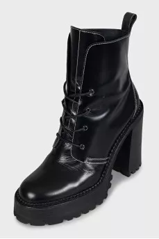 Black leather ankle boots with brand logo