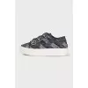 Textile sneakers decorated with crystals