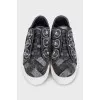Textile sneakers decorated with crystals