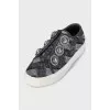 Textile sneakers decorated with crystals