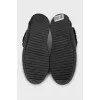 Black sneakers with fur and embossing