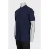 Men's blue polo shirt with elasticated sleeves