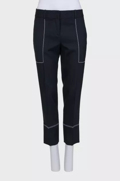 Black trousers with white stitching