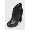 Black lace-up ankle boots