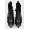 Black lace-up ankle boots