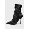 Black boots with a sharp toe