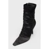 Black boots with a sharp toe